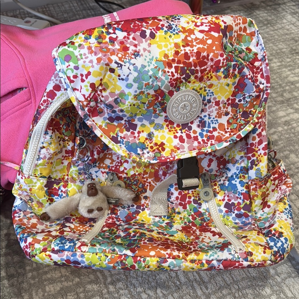 Kipling Colorful Splatter Backpack with Plush Charm